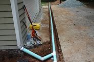 Concrete cutting and drain pipe installation